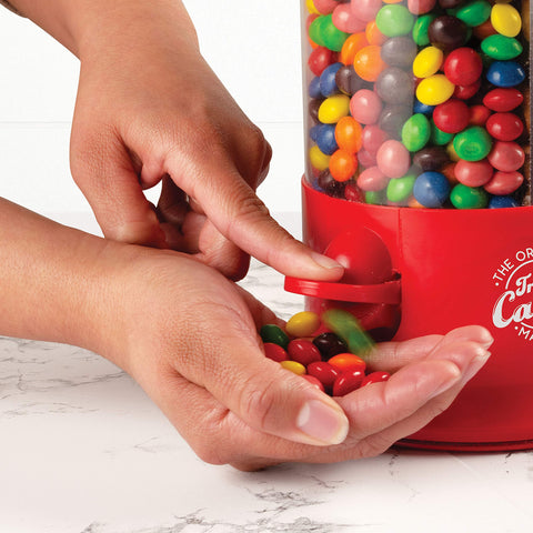 Handy Gourmet triple candy machine demonstrates three-compartment setup for mixed snacks.