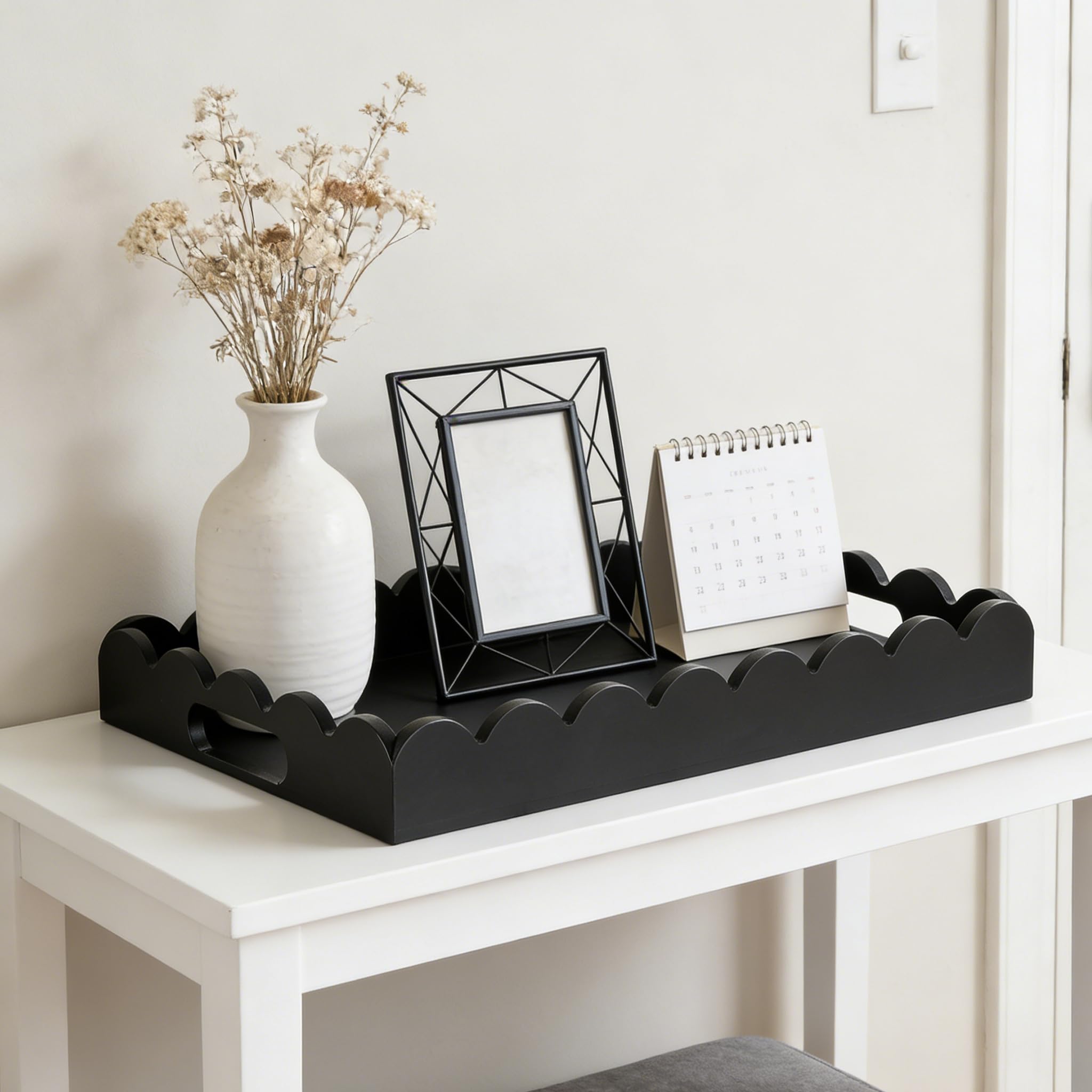 Hanobe decorative tray with scalloped edge elevates the coffee table as a stylish focal point