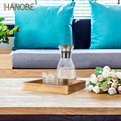 Hanobe square wooden ottoman tray with coffee cups on a small table