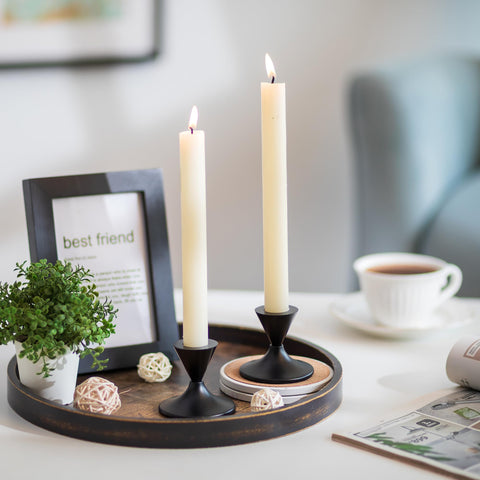 Hanobe wooden tray on ottoman keeps coasters, candles, and small decor together.