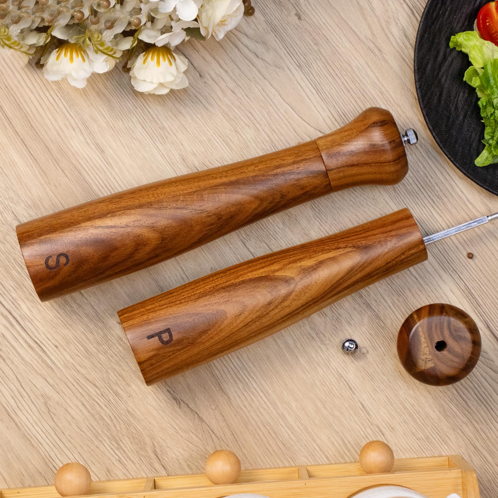 Elegant Haomacro wood grinder set enhances the dining table with versatile seasoning accents.