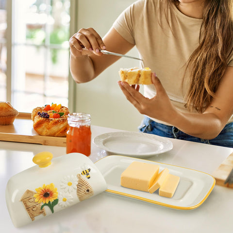 Happy Will butter dish round handle lid for easy grip and serving.