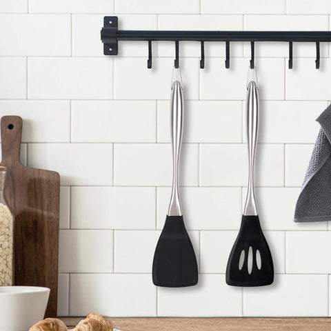 Happy Kit silicone spatula over pancakes, smooth release from a nonstick surface.