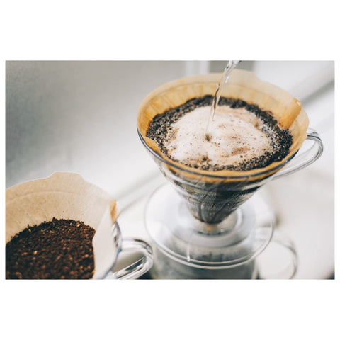 Pour-over setup with V60 dripper and filter pack ready
