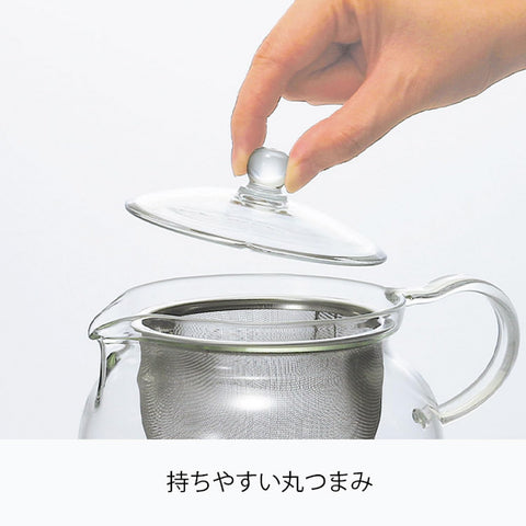HARIO ChaCha Kyusu Maru handle close-up, ergonomic grip for easy pouring.