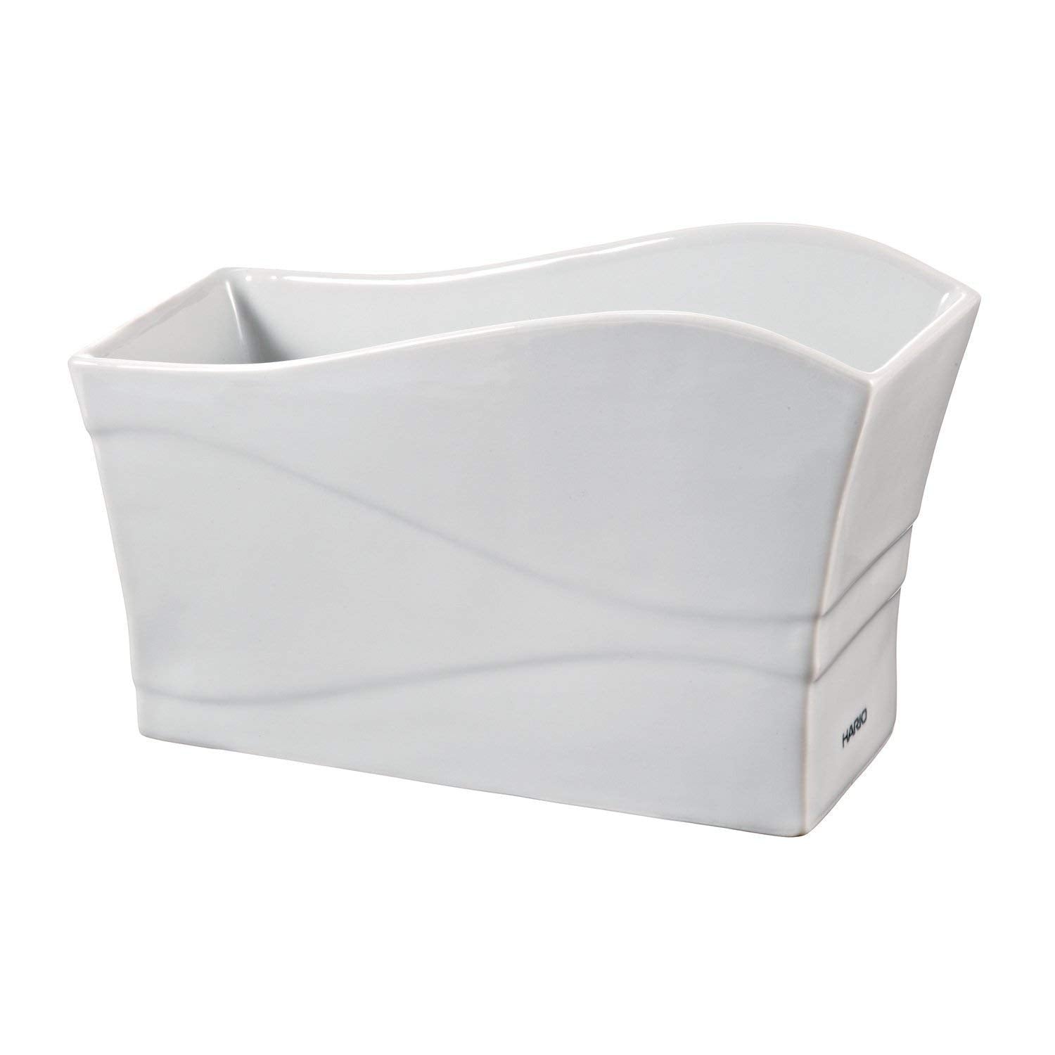 Hario olive wood filter stand enhances aesthetics and stability.