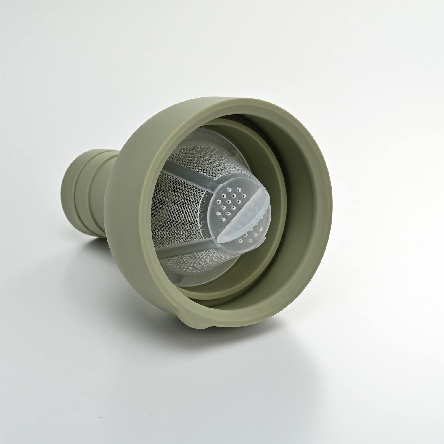 HARIO smoky green glass close-up highlights glass finish and style