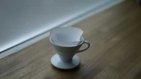 Hario V60 size 02 pour-over setup with filters enhances aroma and balance