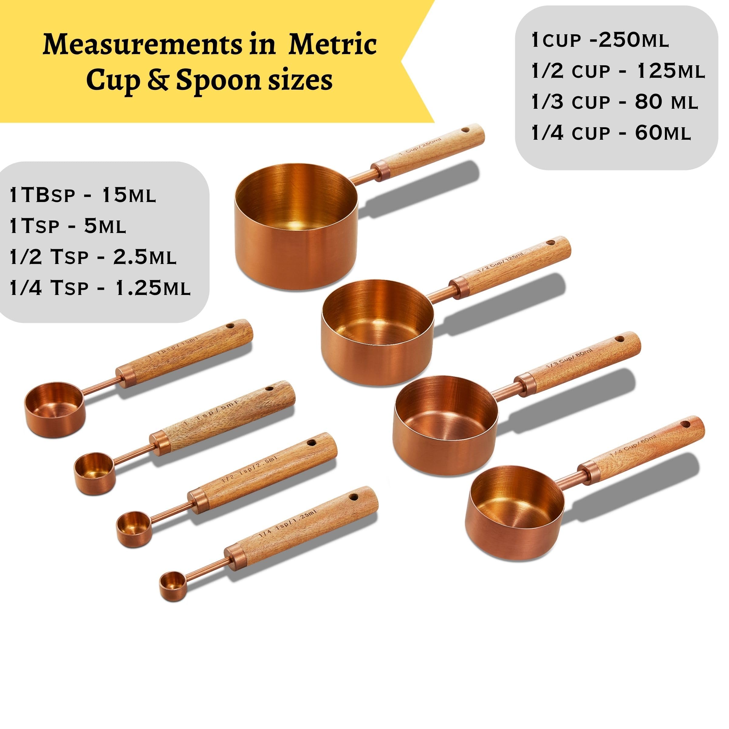 HARURI close-up of engraved sizes on wooden-handled measuring cups for quick reference.