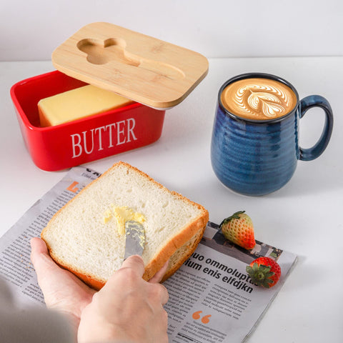 Hasense butter dish on kitchen counter with glossy porcelain finish.