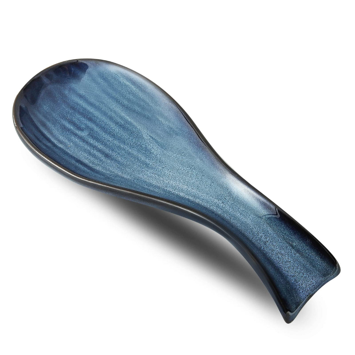 HASENSE ceramic spoon rest on stove top catching drips and keeping the surface clean.