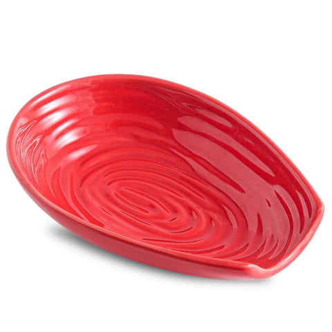 Hasense red spoon rest on counter keeps utensils organized and clean.