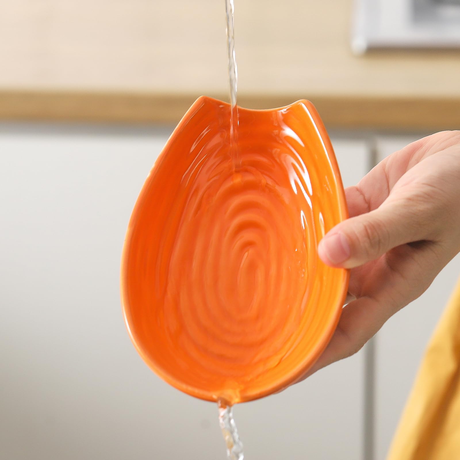 Hasense spoon rest doubles as serving dish when not in use.
