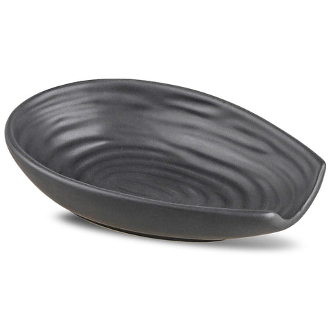 Hasense spoon rest on stove top keeps cookware clean and organized.