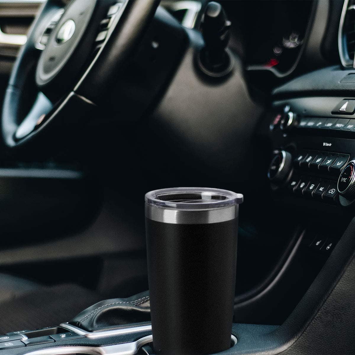 HASLE OUTFITTERS 20oz tumbler fitting into most cup holders during travel.