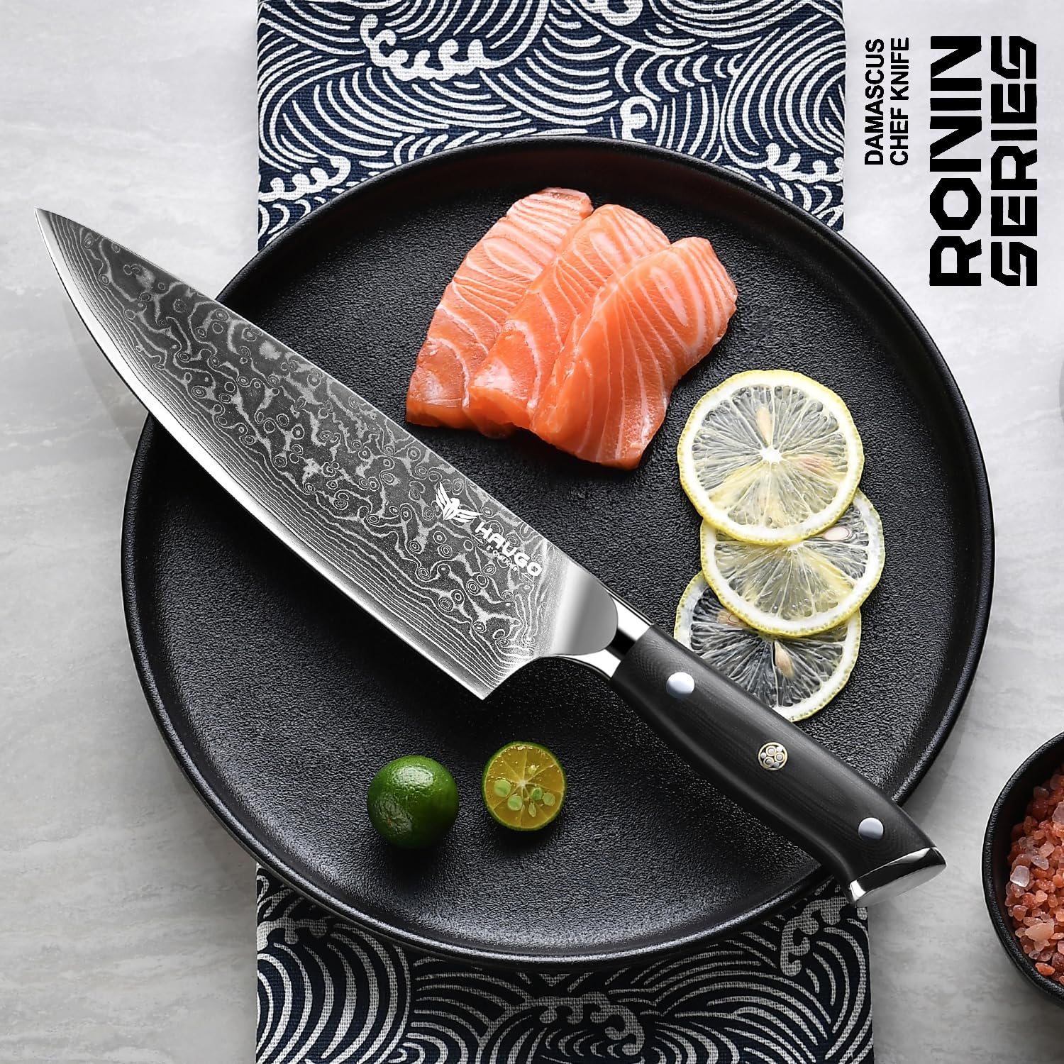 Haugo Damascus knife with VG10 core and 67 layers for lasting sharpness and durability.