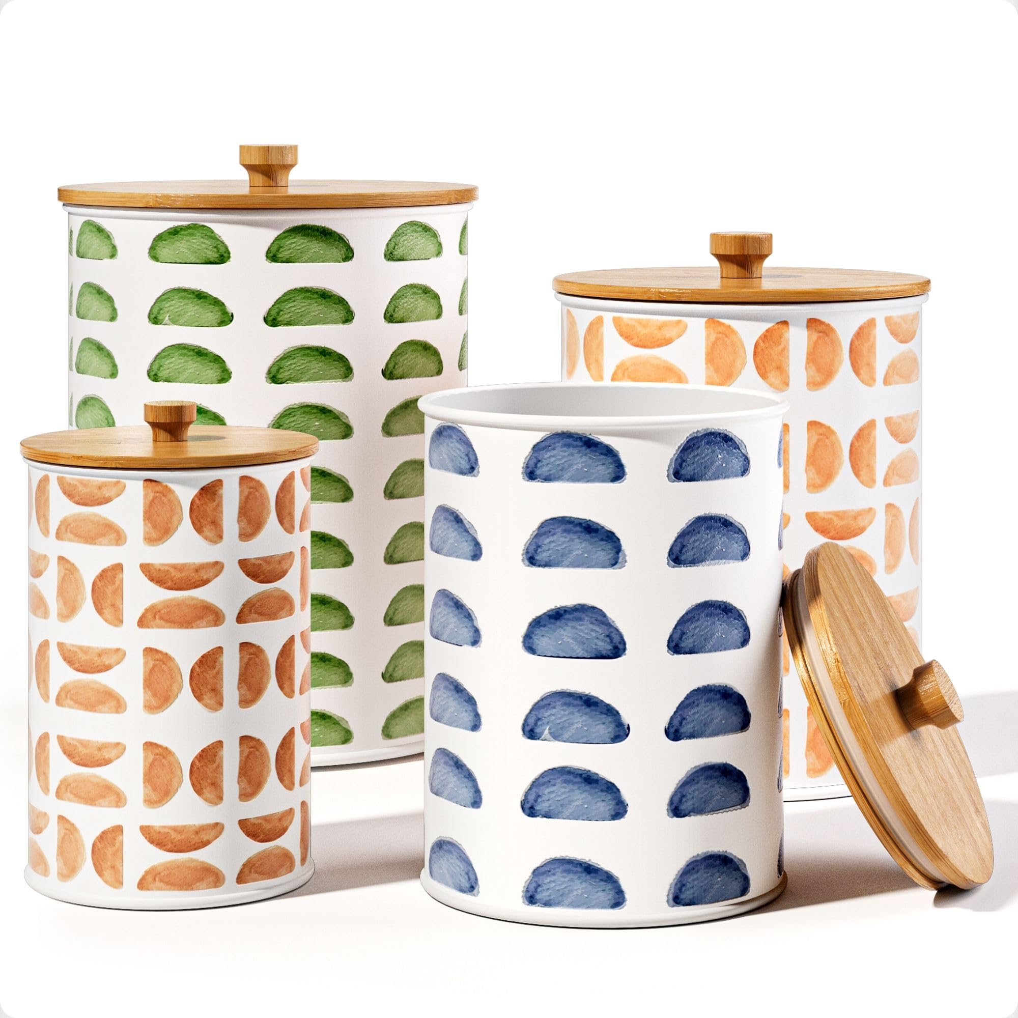 HB Design Co patterned iron canisters with airtight lids on a counter for flour storage