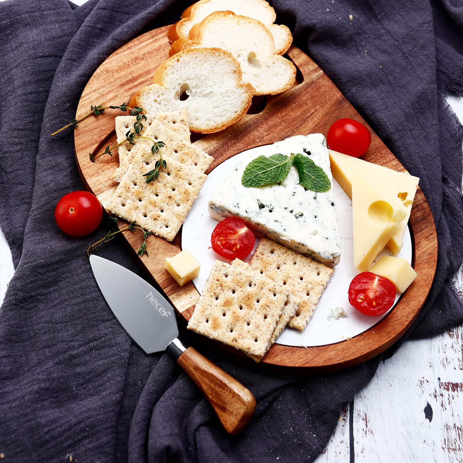hecef cookies and appetizers displayed attractively on the board