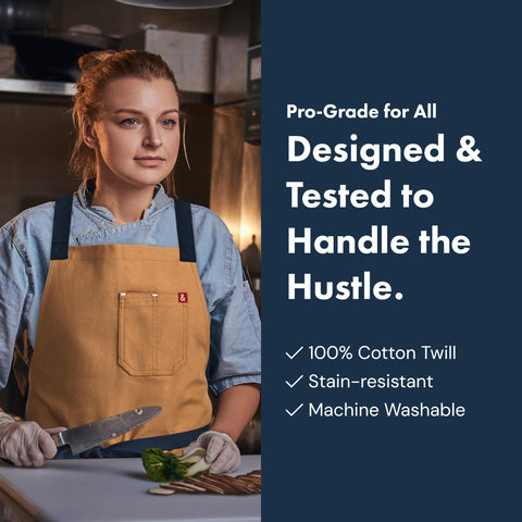 Hedley & Bennett Crossback Apron chest pen slot for quick notes while cooking.