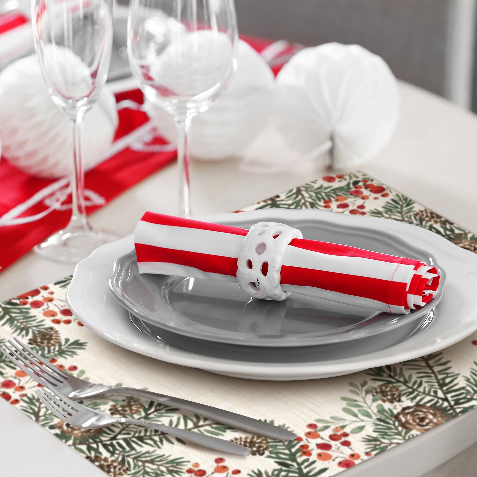 Heentan placemats enhance holiday table ambience across tables and buffets.