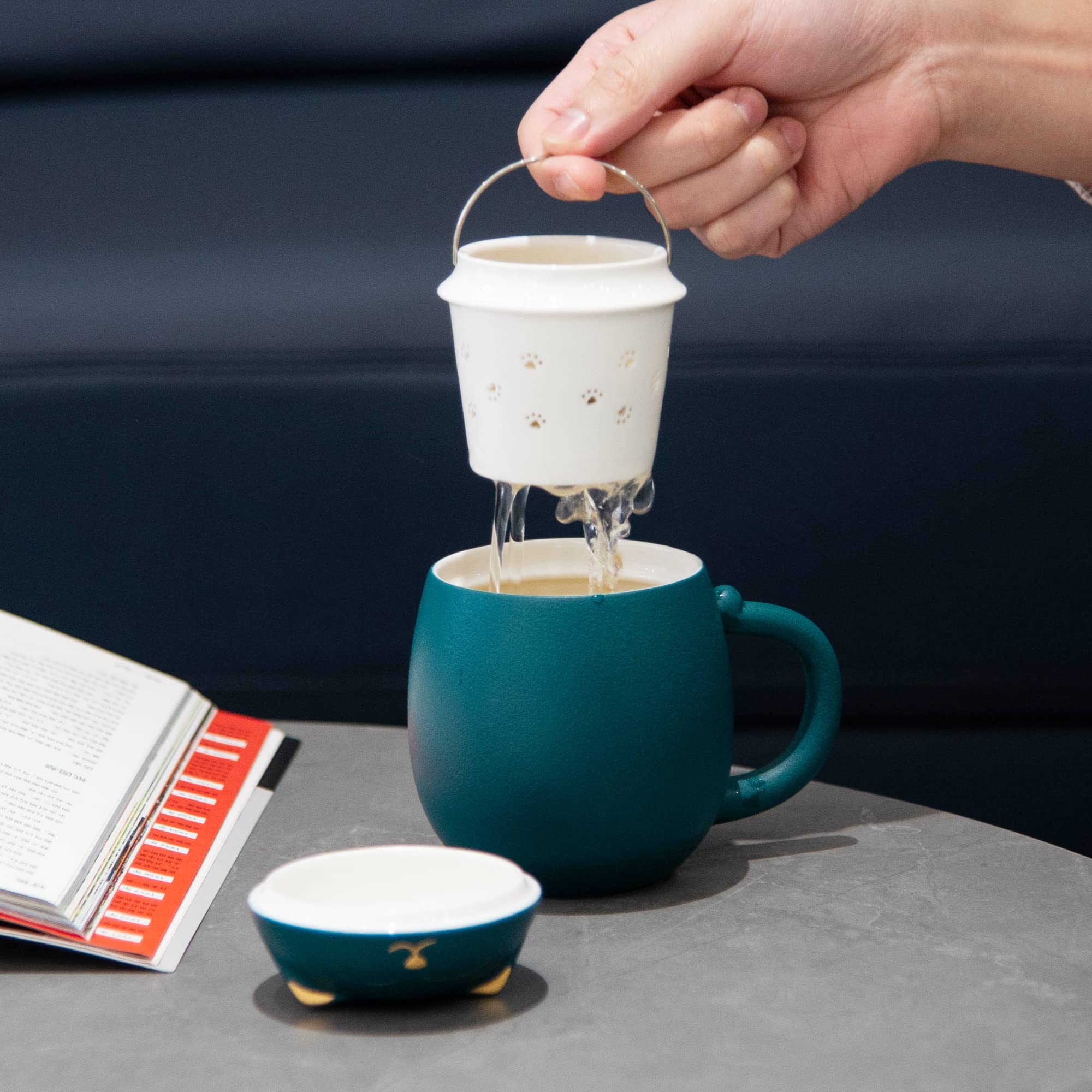 HEER cat tea cup ceramic strainer preserves subtle tea flavors.