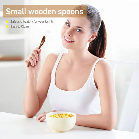 Hefild narrow-tip spoon demonstrates access into jars for jams.