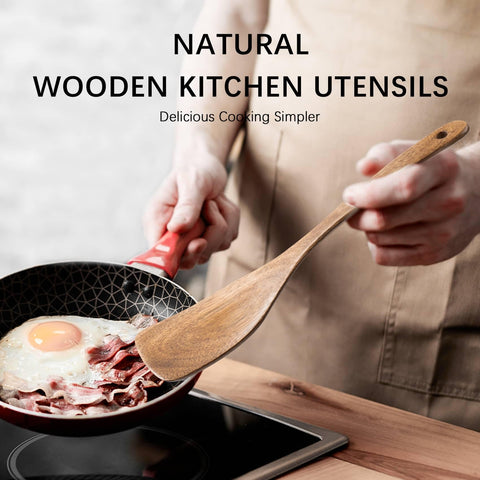 Hefild long-handle spatula reaching into a deep wok