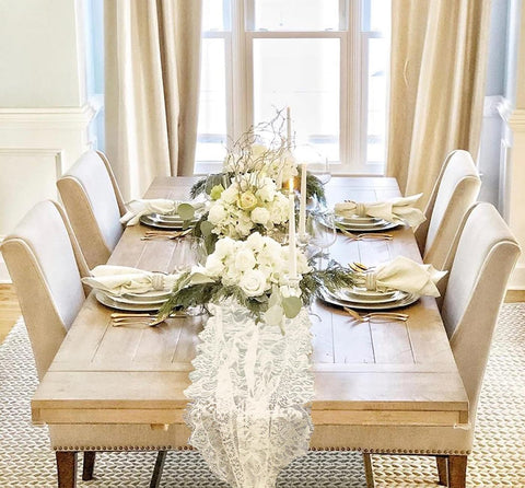 HEIPINIUYE embroidery detail highlights delicate craftsmanship on a white runner