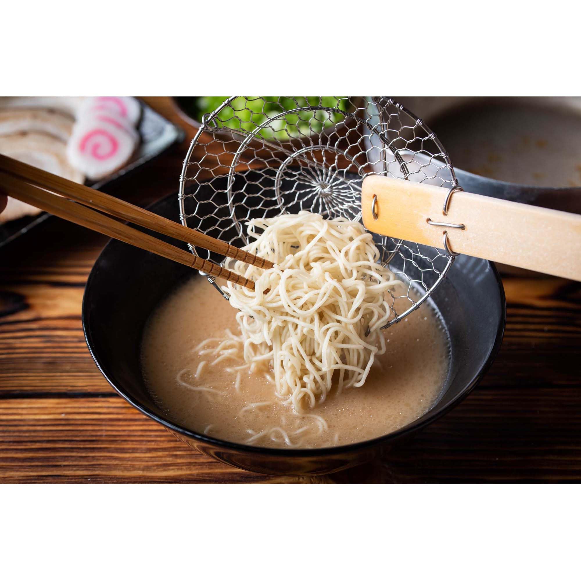 Helen's Asian Kitchen spider strainer great for lifting noodles and dumplings.