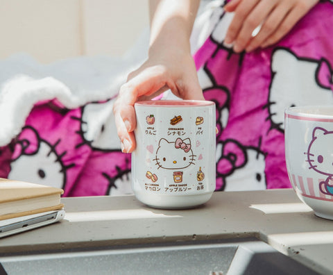 Hello Kitty teacup with pink interior enhancing beverage presentation