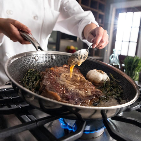 Dishwasher-safe Hell's Kitchen Hybrid pan supports quick post-cook cleanup.