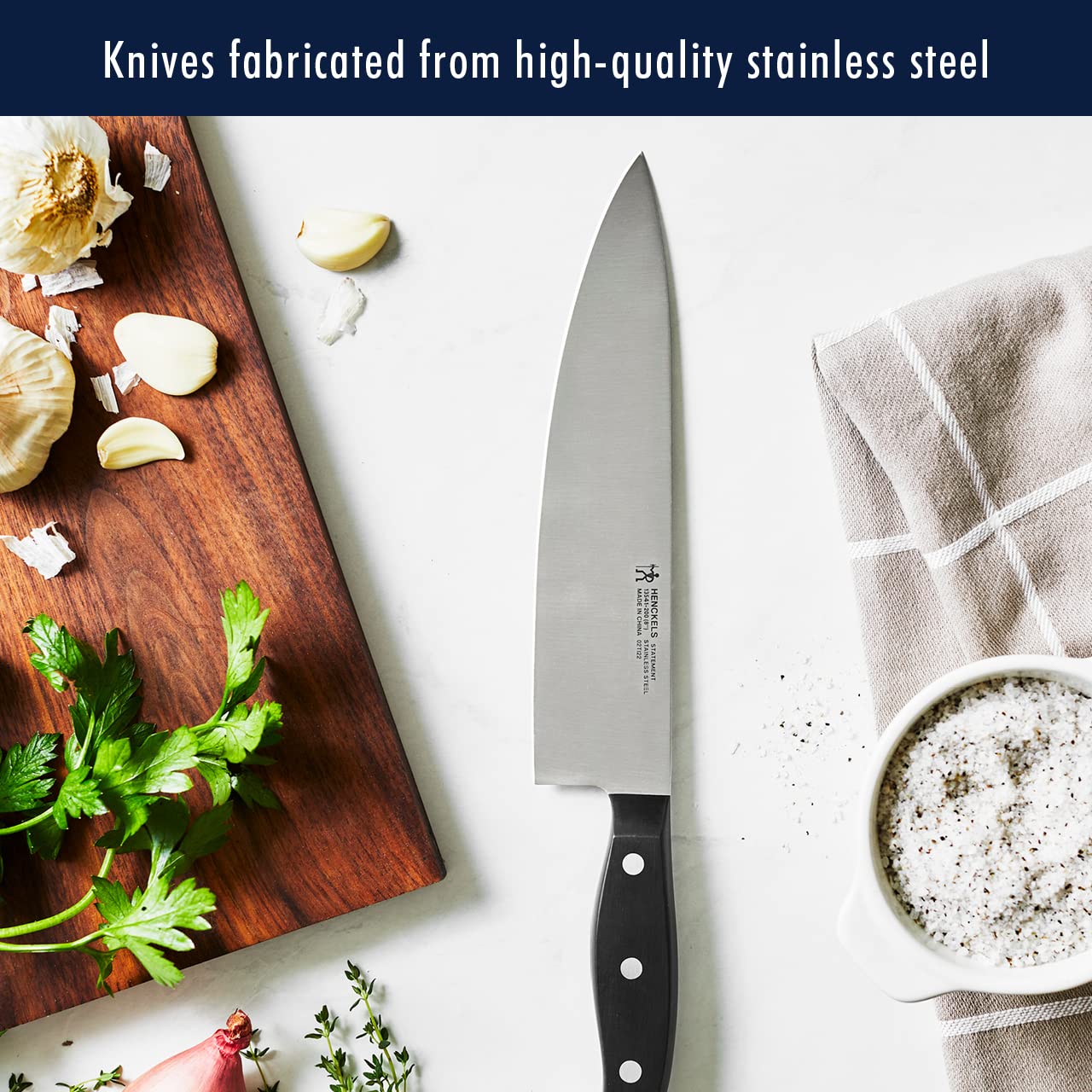 HENCKELS 8-inch bread knife with serrated edge for clean crust cuts.