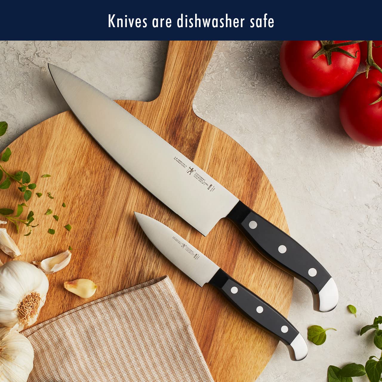 HENCKELS blade detail shows sturdy stainless steel construction.