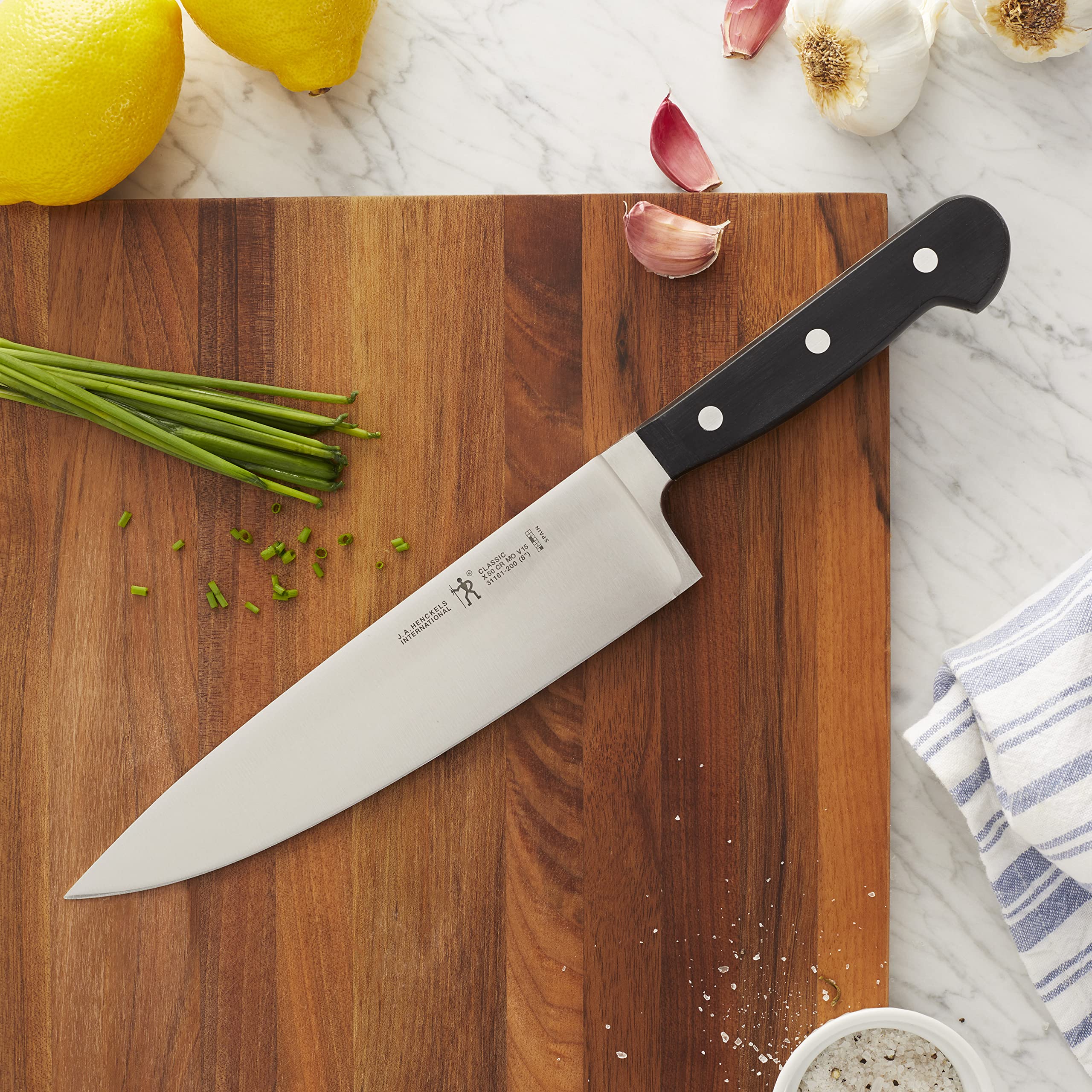 Henckels Classic knife handle and balance for comfortable, controlled slicing.