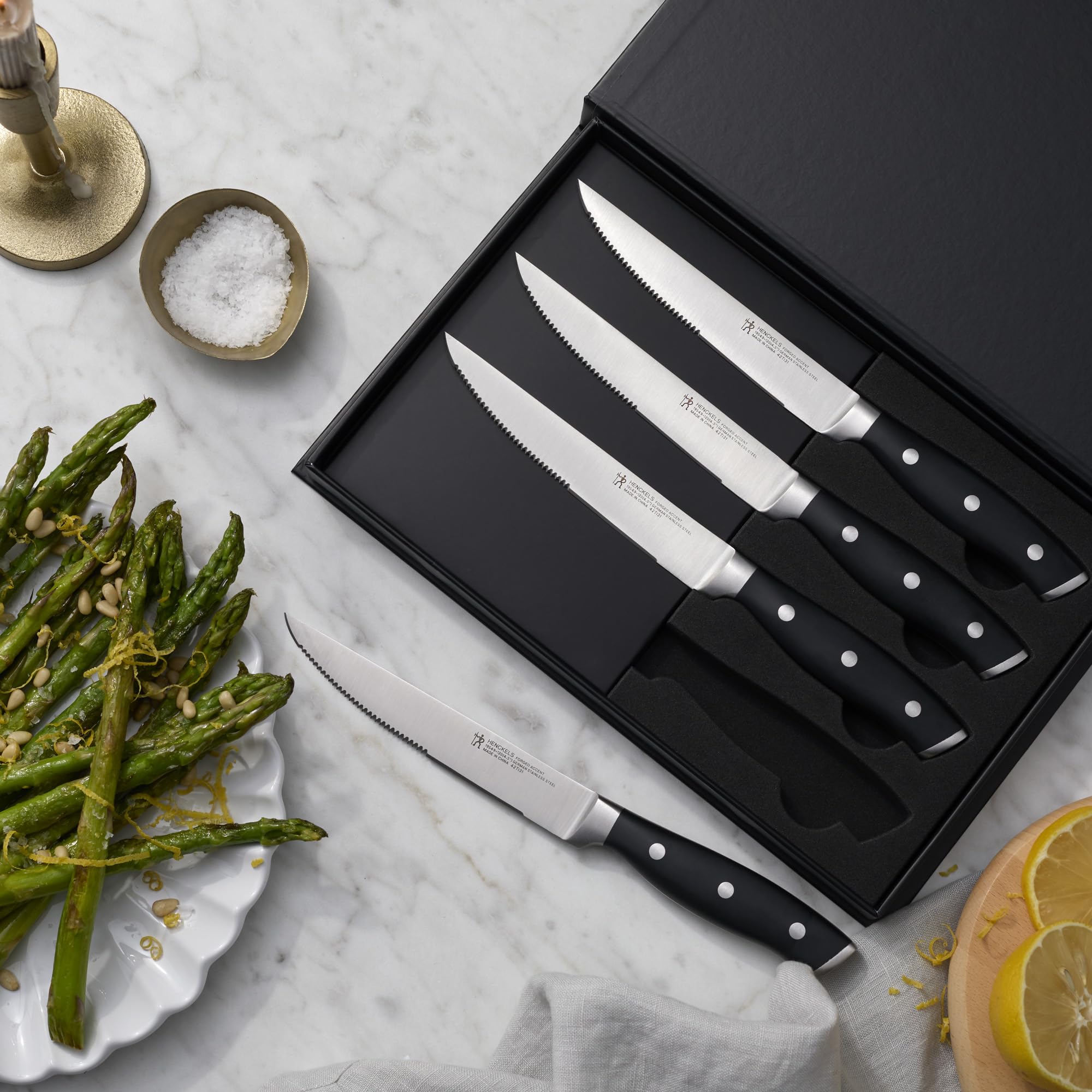HENCKELS rust-free blade cleans easily by hand or dishwasher.