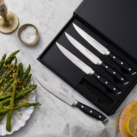 HENCKELS rust-free blade cleans easily by hand or dishwasher.