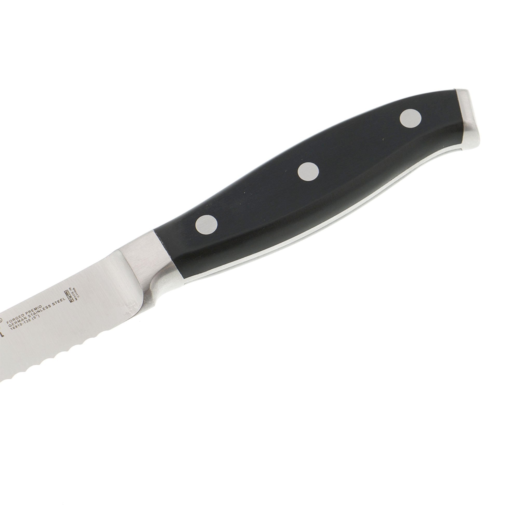 Henckels Forged Premio handle close-up showing ergonomic triple-rivet design.