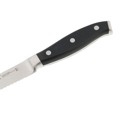 Henckels Forged Premio handle close-up showing ergonomic triple-rivet design.