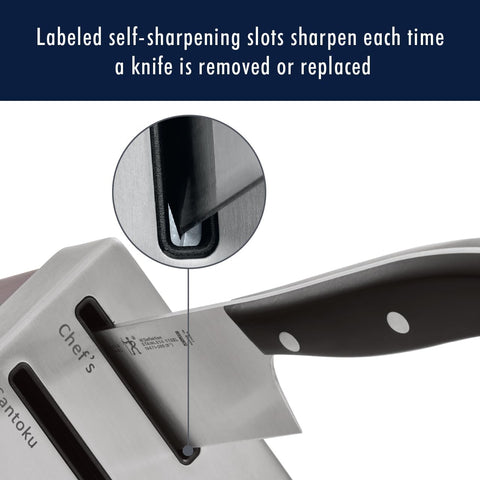 Henckels Statement Santoku knife in action for versatile chopping.