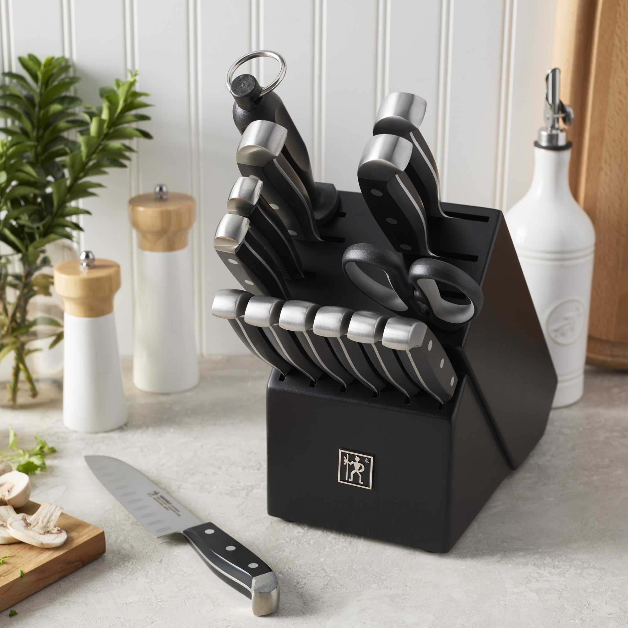 HENCKELS 7-inch santoku with grantons reduces sticking.