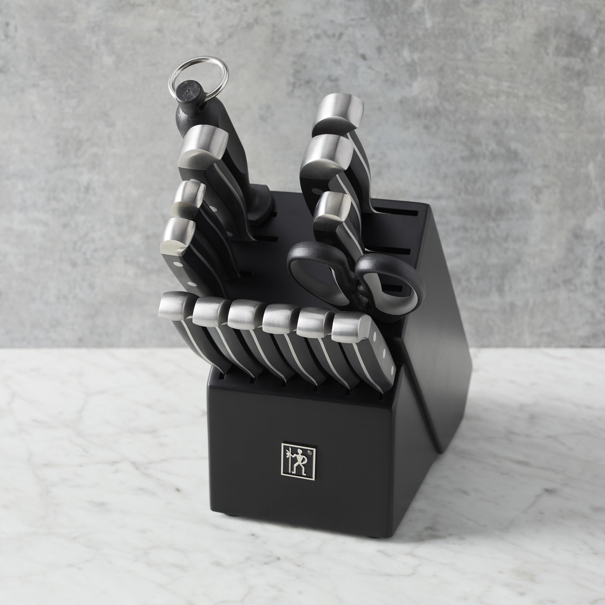 HENCKELS block with sharpener keeps blades sharp and organized.