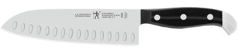 Razor-sharp Henckels blades in a high-precision kitchen environment.