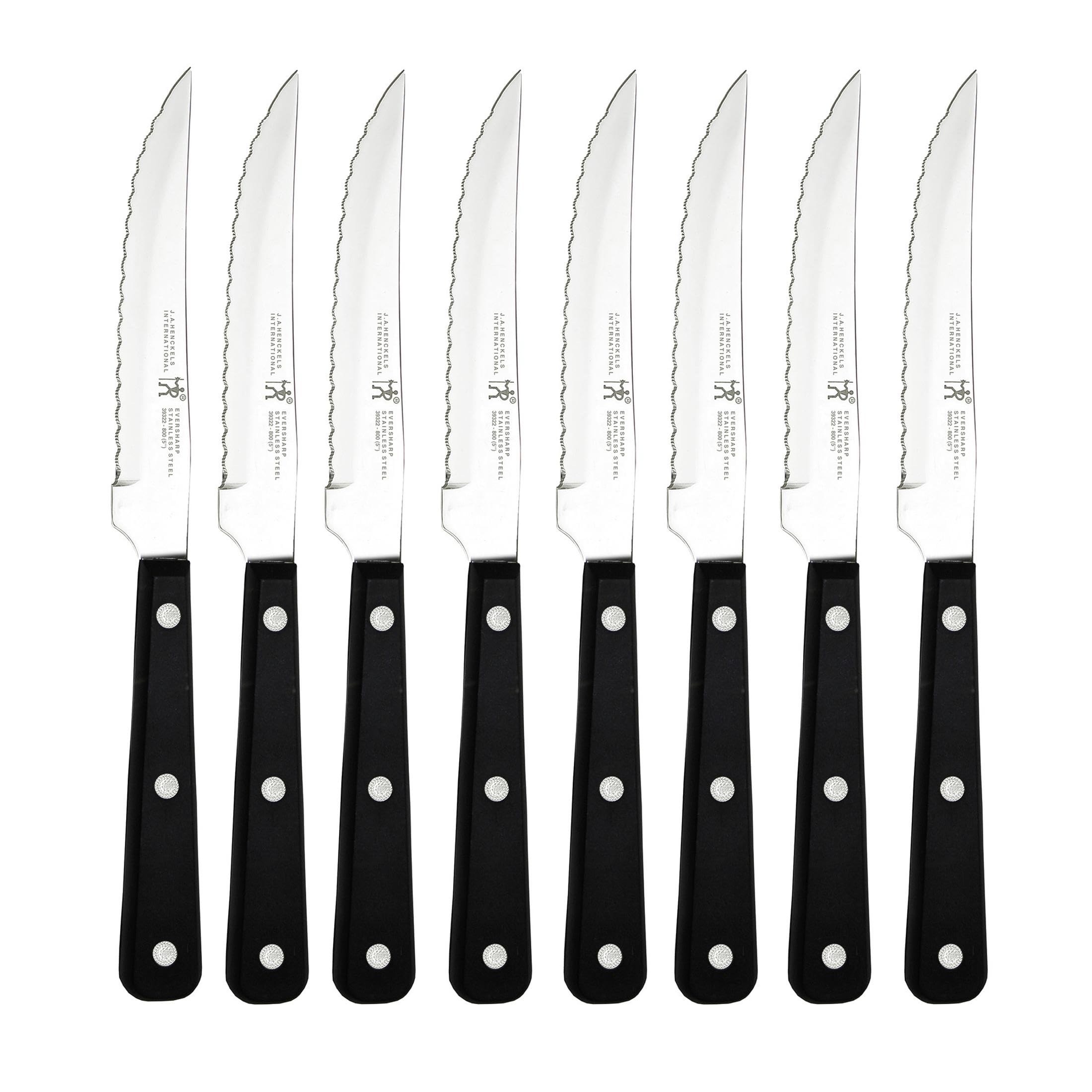 Henckels Razor-Sharp edge close-up for precise steak slicing.