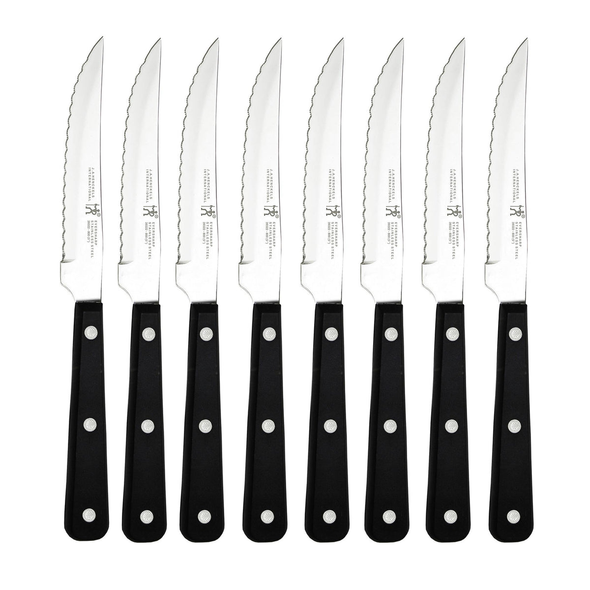 Henckels Razor-Sharp edge close-up for precise steak slicing.