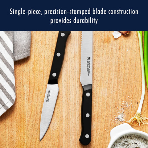 HENCKELS Solution 5.5-inch hollow-edge santoku knife precision slicing.