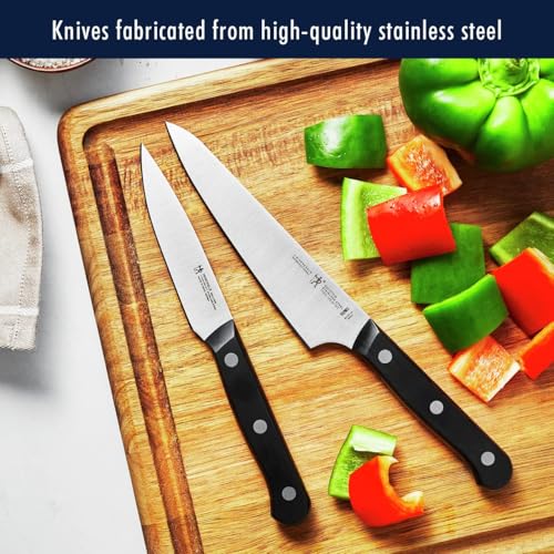 Henckels Solution 5-inch serrated utility knife cuts crusty bread effortlessly.