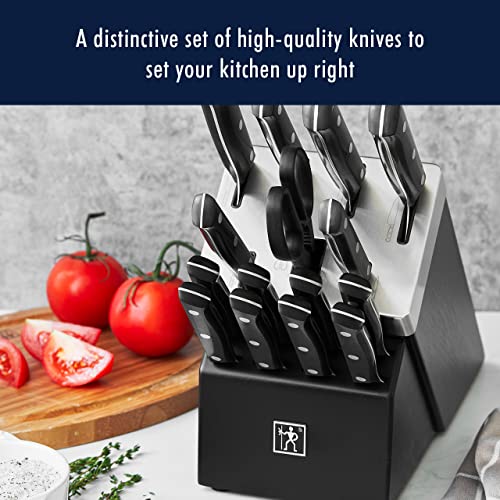 HENCKELS Solution 8-inch chef knife slicing herbs with ease.