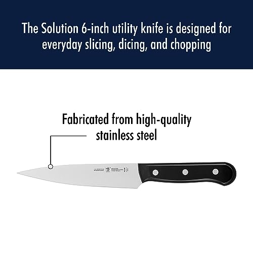 Close-up of Henckels blade showing ultra-sharp edge for precise cuts.