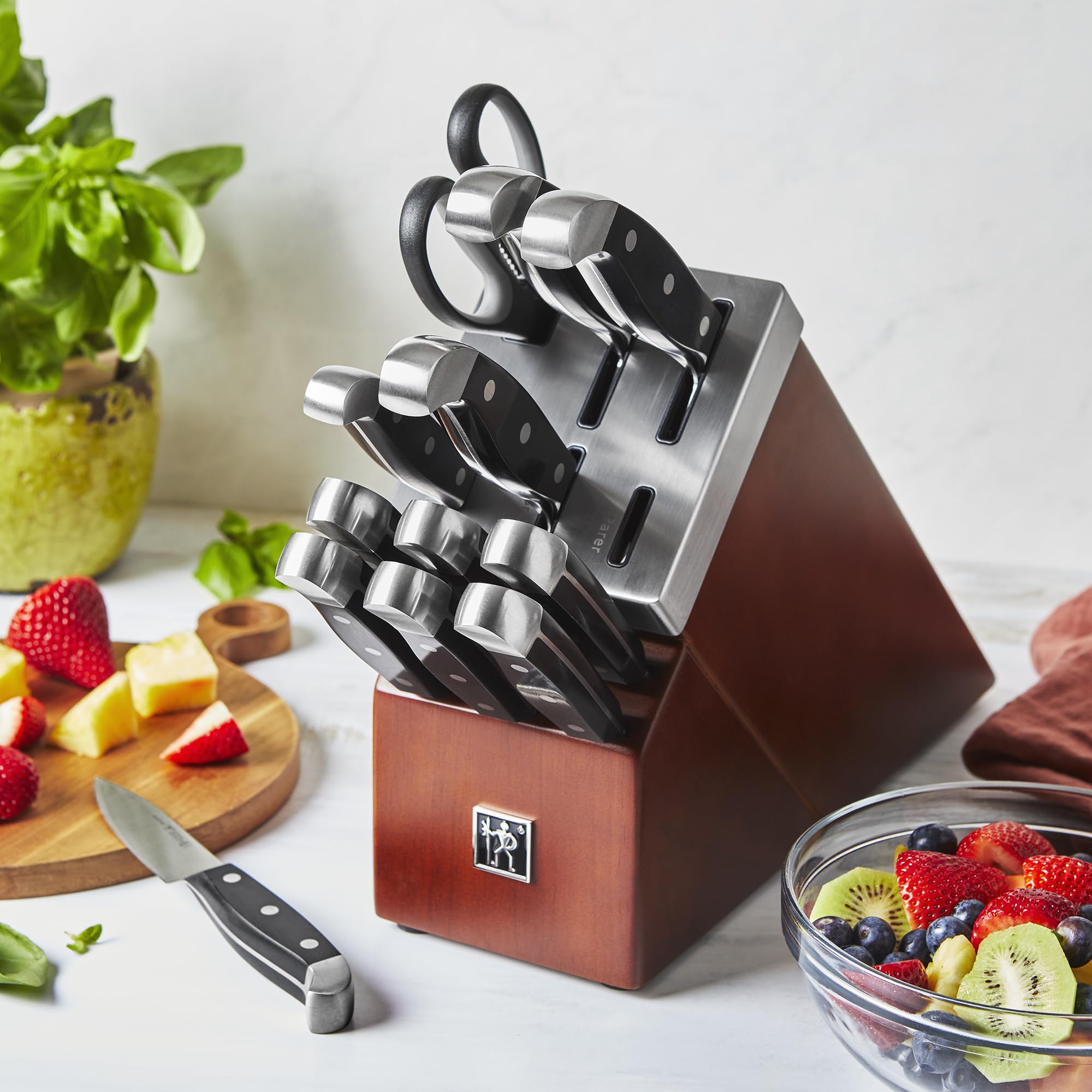 Henckels Statement knives in self-sharpening slots maintain precise, long-lasting sharpness.