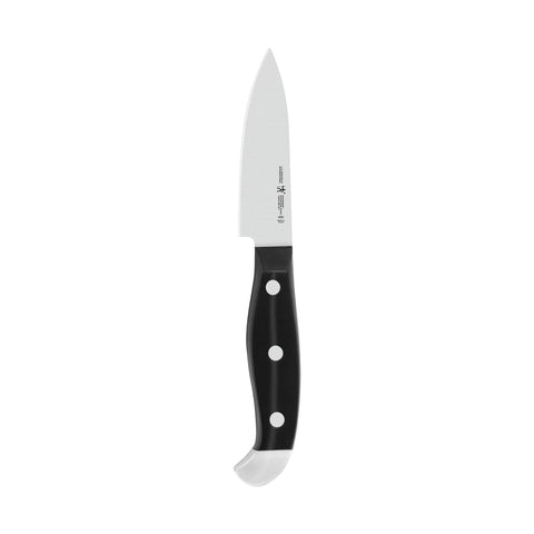 Henckels Statement paring knife blade close-up showing razor-sharp edge for precise cuts.